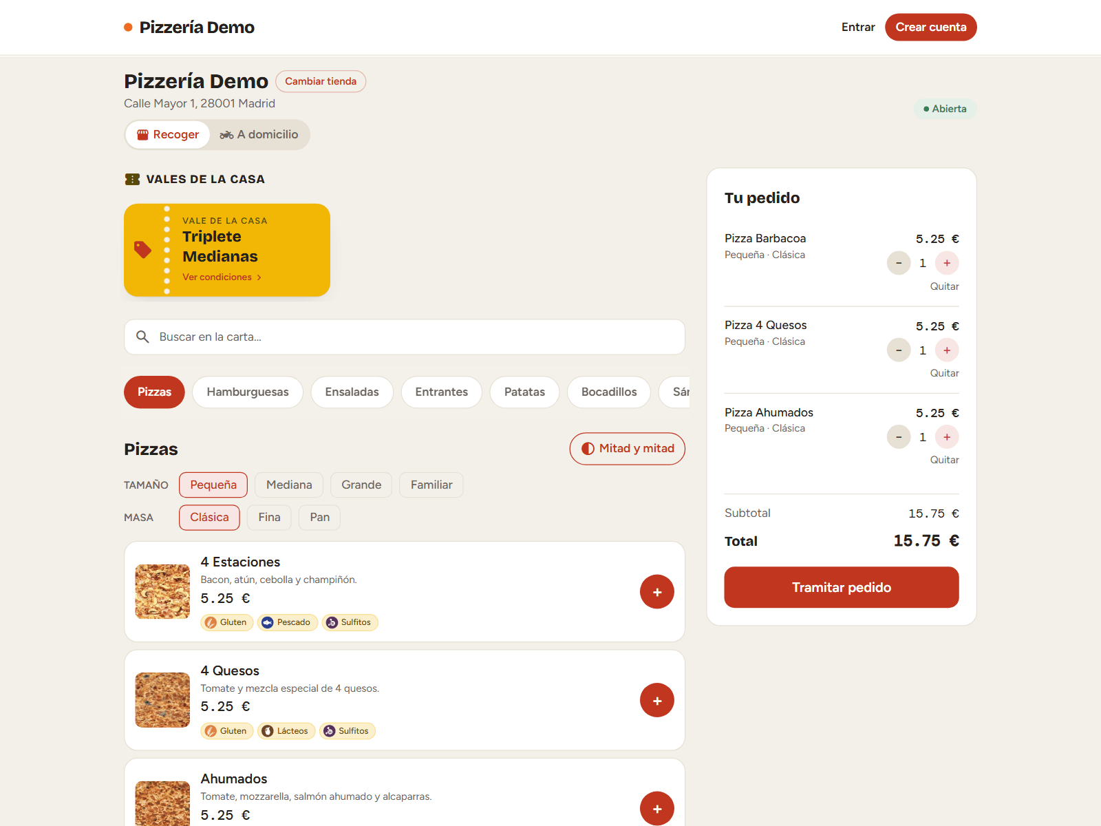 Carta de la tienda online con fotos, alérgenos, vales de la casa y el carrito con tres pizzas.